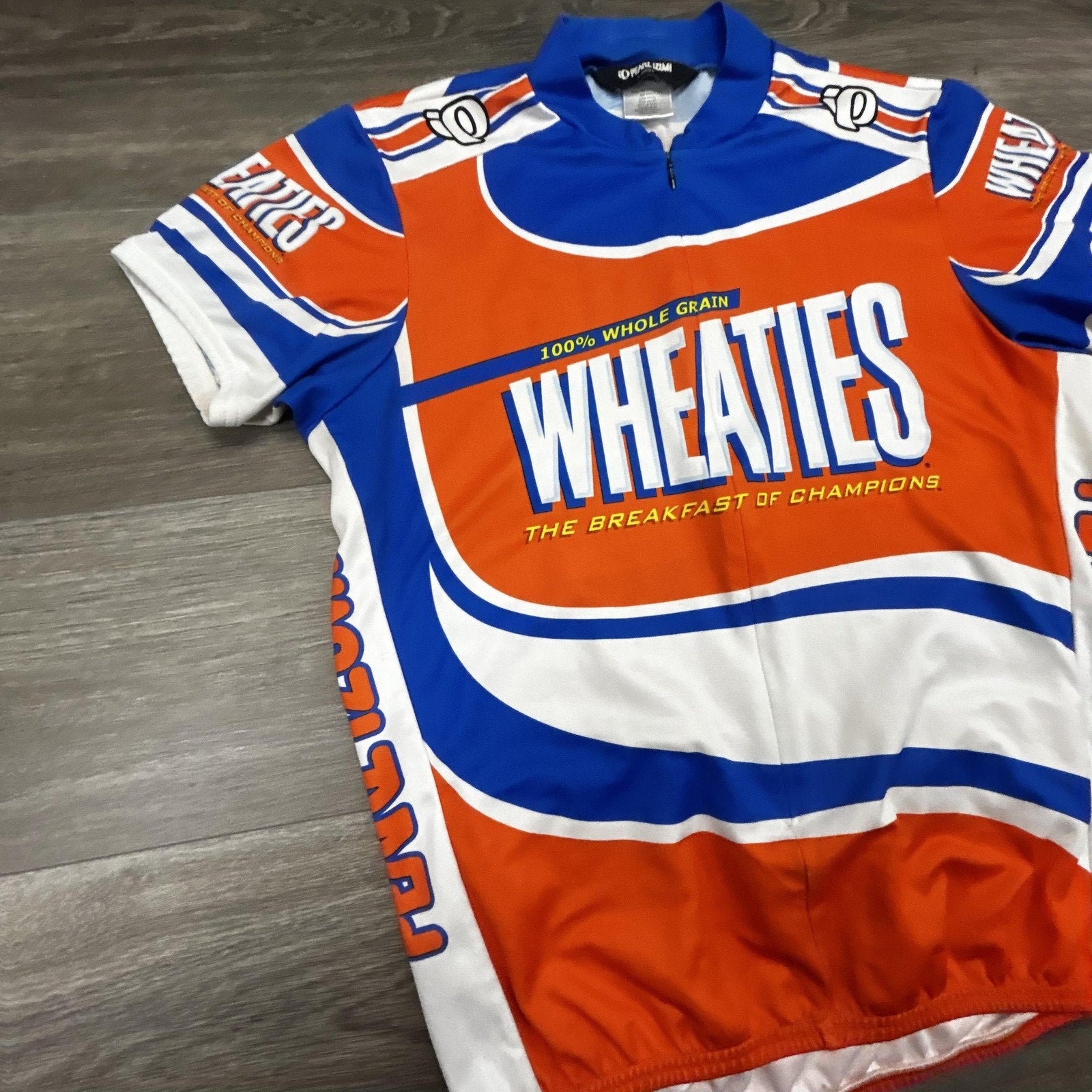 Wheaties Cycling Jersey Mens Large Orange Pearl Izumi 1/4 Zip Pockets Bike Top