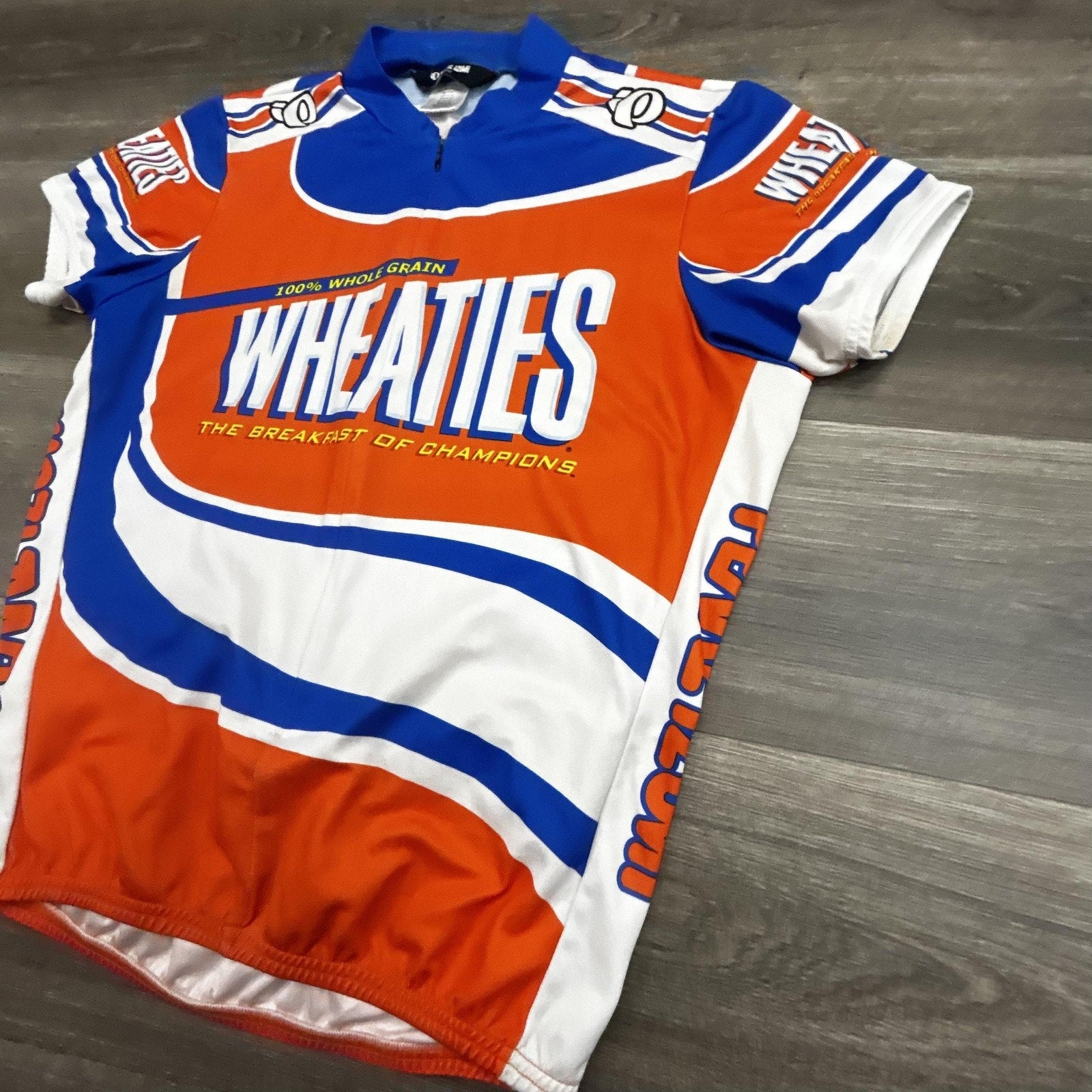 Wheaties Cycling Jersey Mens Large Orange Pearl Izumi 1/4 Zip Pockets Bike Top